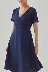 Demi V-Neck Textured Skater Dress in Navy Blue