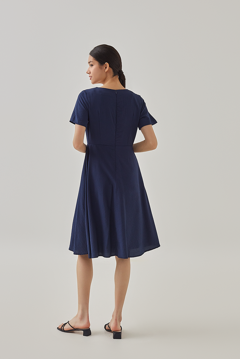 Demi V-Neck Textured Skater Dress in Navy Blue