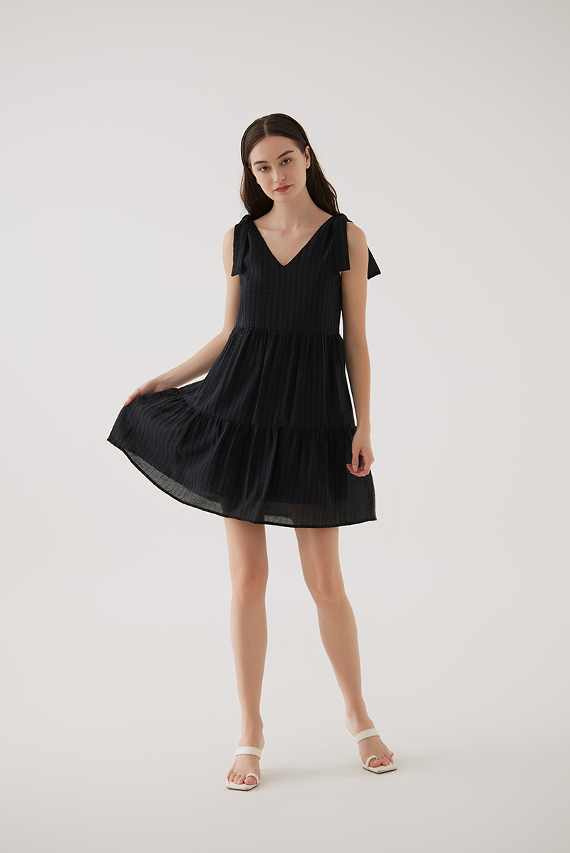 Sereba Self-Tie Ribbon Tiered Dress in Black