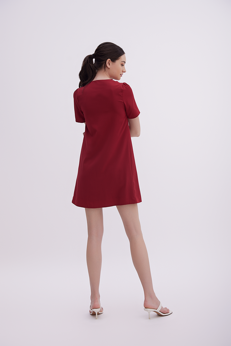 Jelani Ruched Shift Dress in Maroon