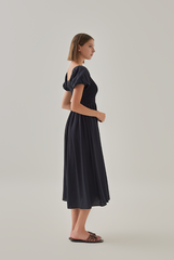 Quinn Puff Sleeves Smocked Dress in Navy Blue