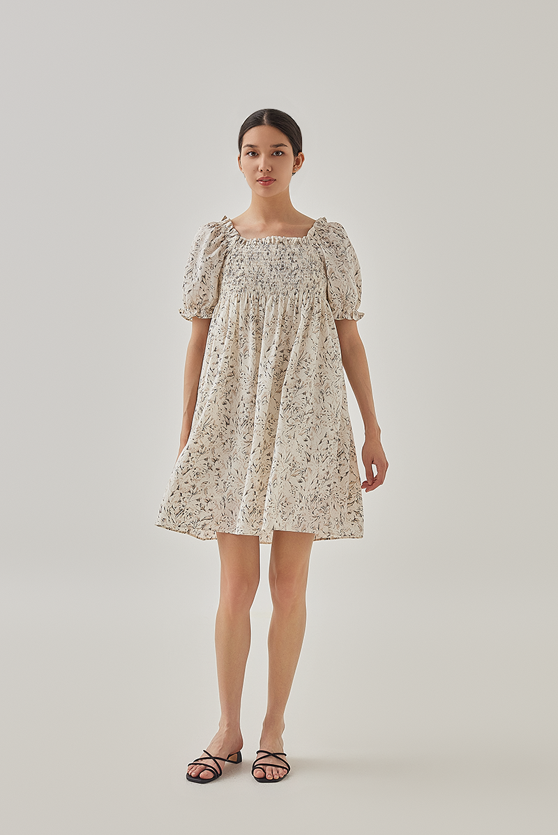 Niana Smocked Floral Babydoll Dress in Rice