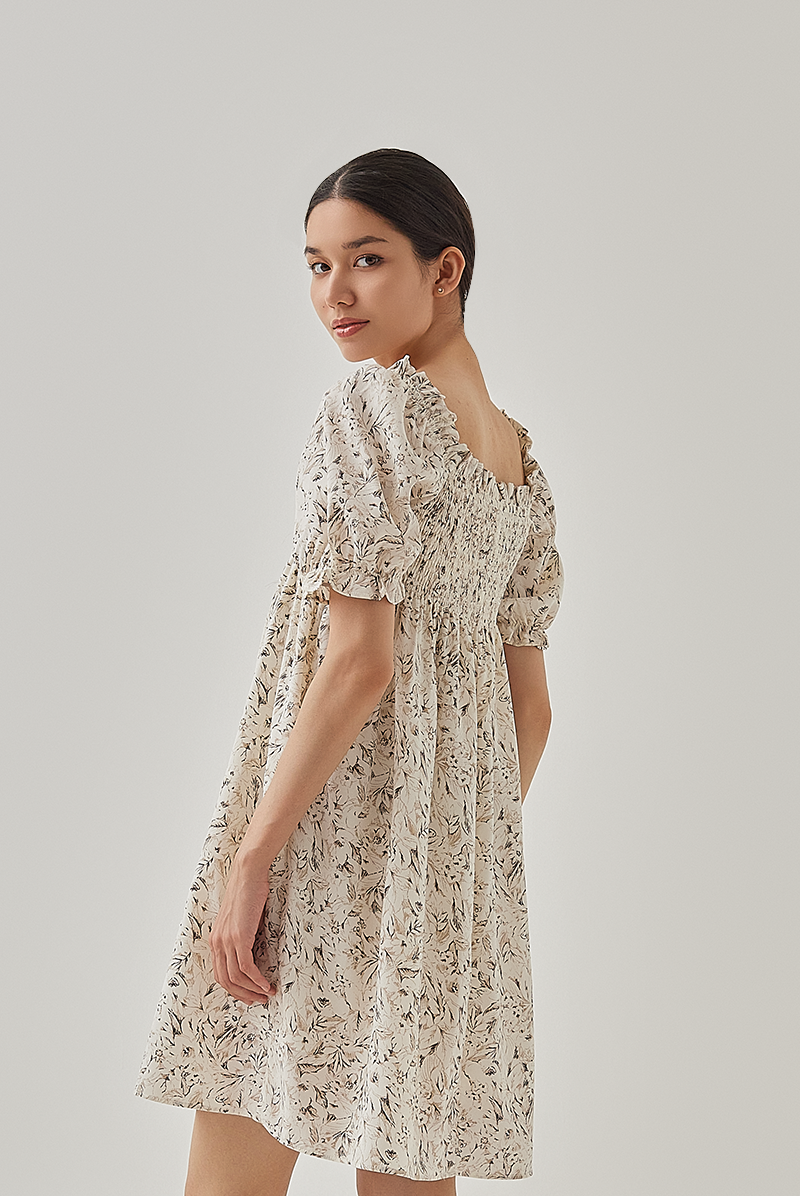 Niana Smocked Floral Babydoll Dress in Rice