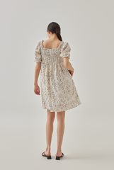 Niana Smocked Floral Babydoll Dress in Rice