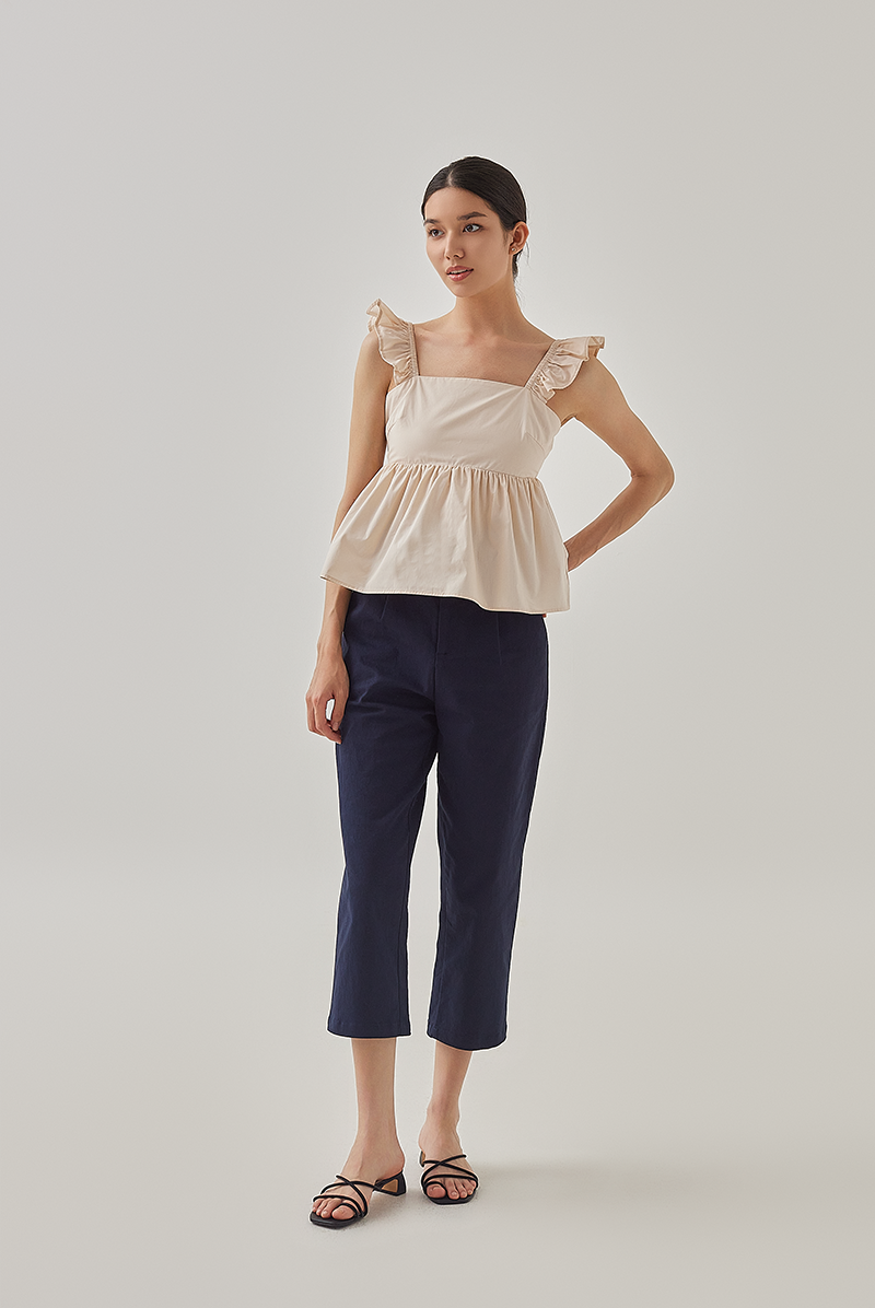 Brie Cut Out Back Peplum Top in Rice