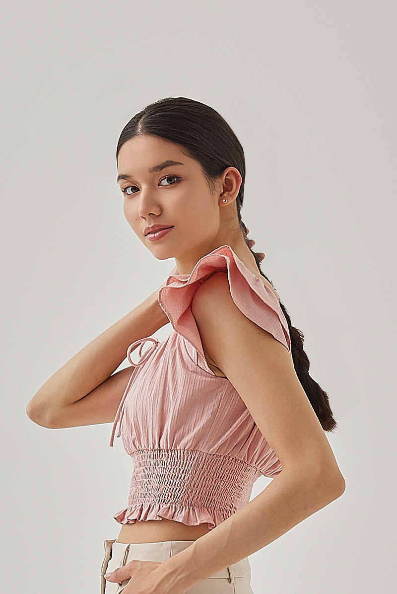 Cove Flutter Sleeves Smocked Crop Top in Dusty Pink