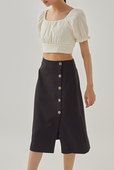 Macie Side Button Midi Skirt in Black