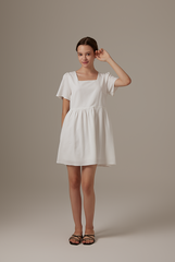 Jeradine Babydoll Dress in White