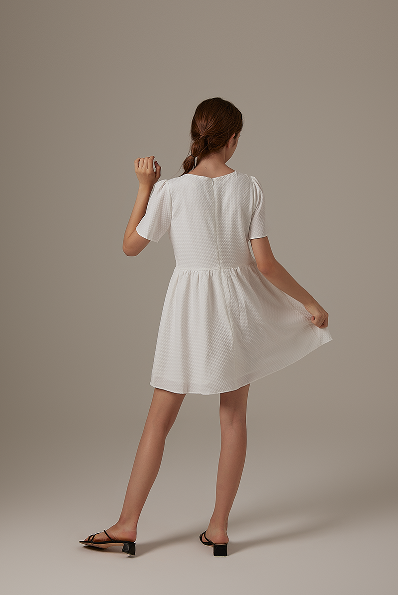 Jeradine Babydoll Dress in White