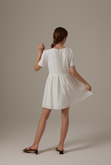 Jeradine Babydoll Dress in White