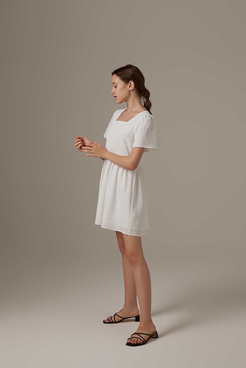 Jeradine Babydoll Dress in White