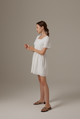 Jeradine Babydoll Dress in White
