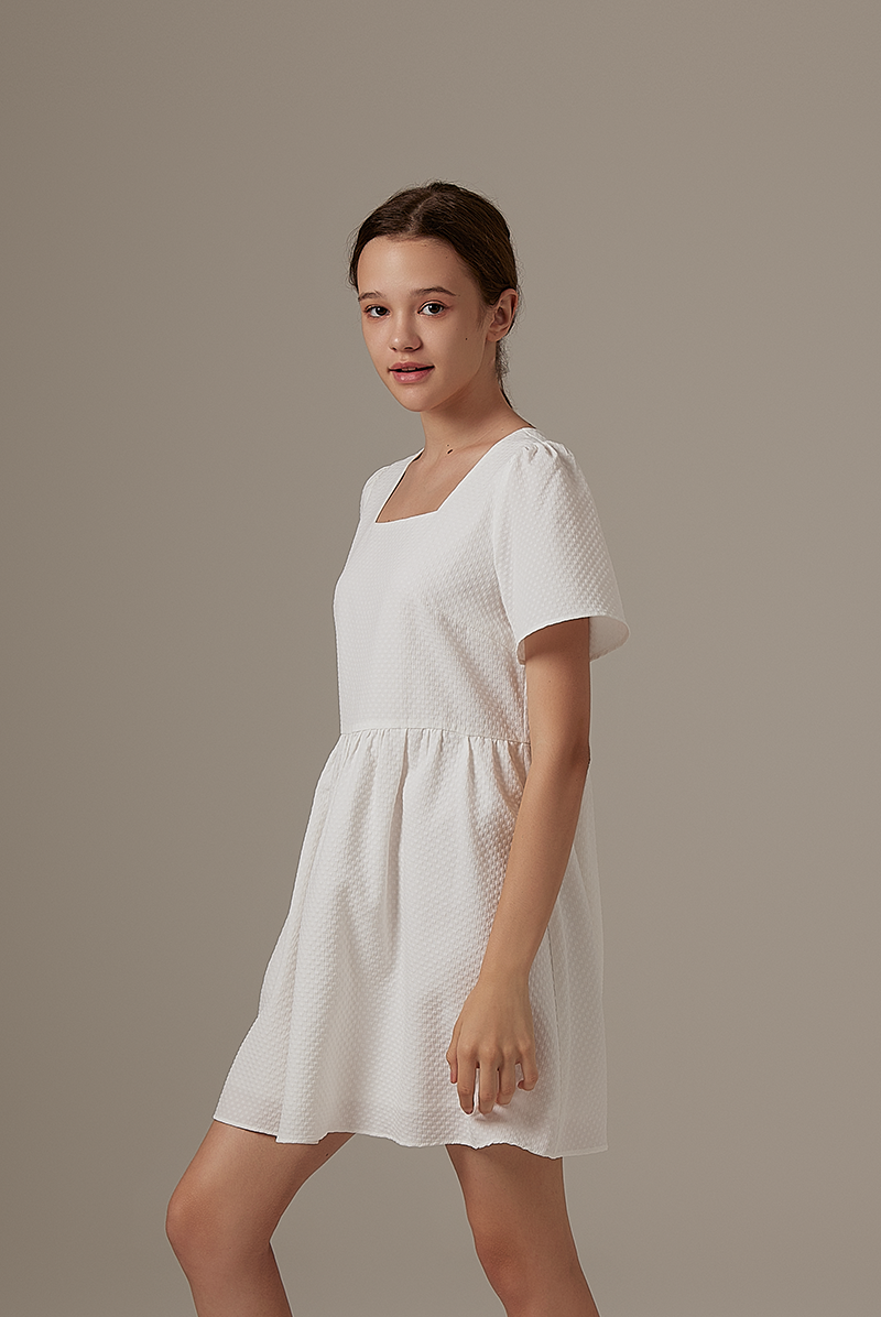 Jeradine Babydoll Dress in White