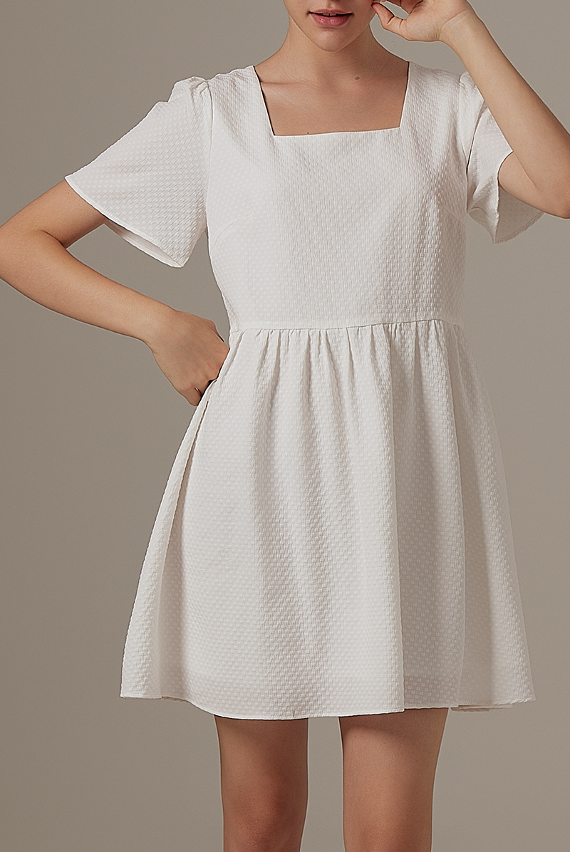 Jeradine Babydoll Dress in White