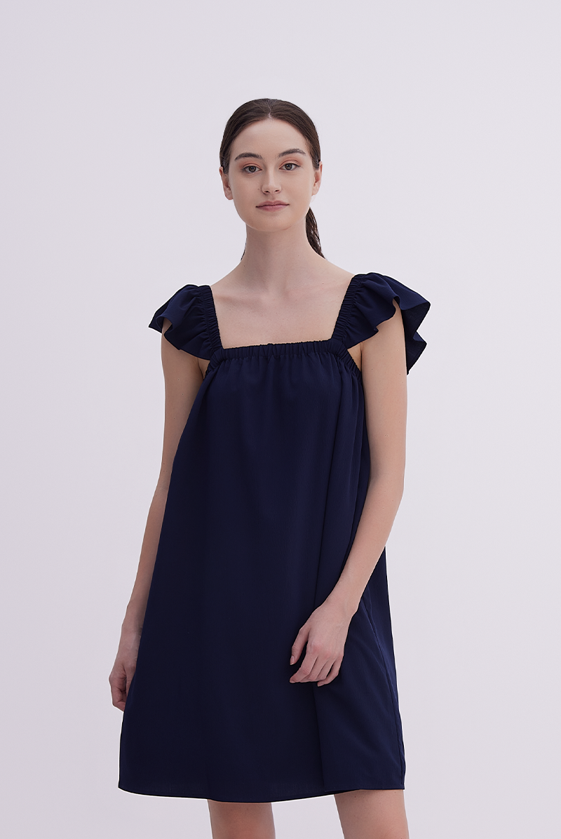 Isla Sleeveless Flutter Dress in Navy Blue