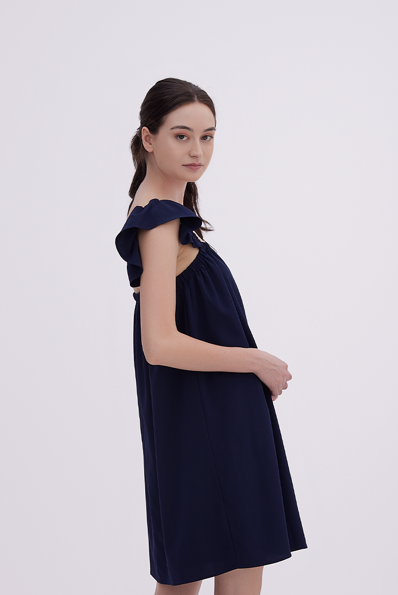 Isla Sleeveless Flutter Dress in Navy Blue