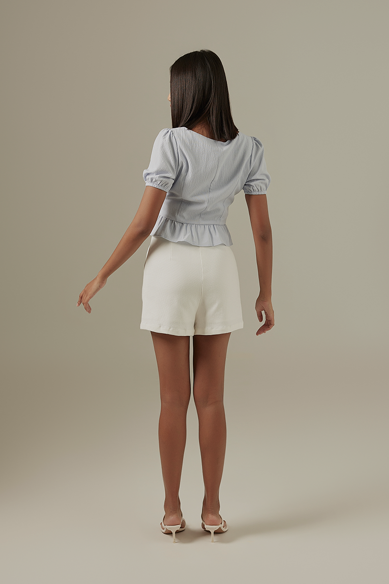Carinne Peplum Top in Periwinkle