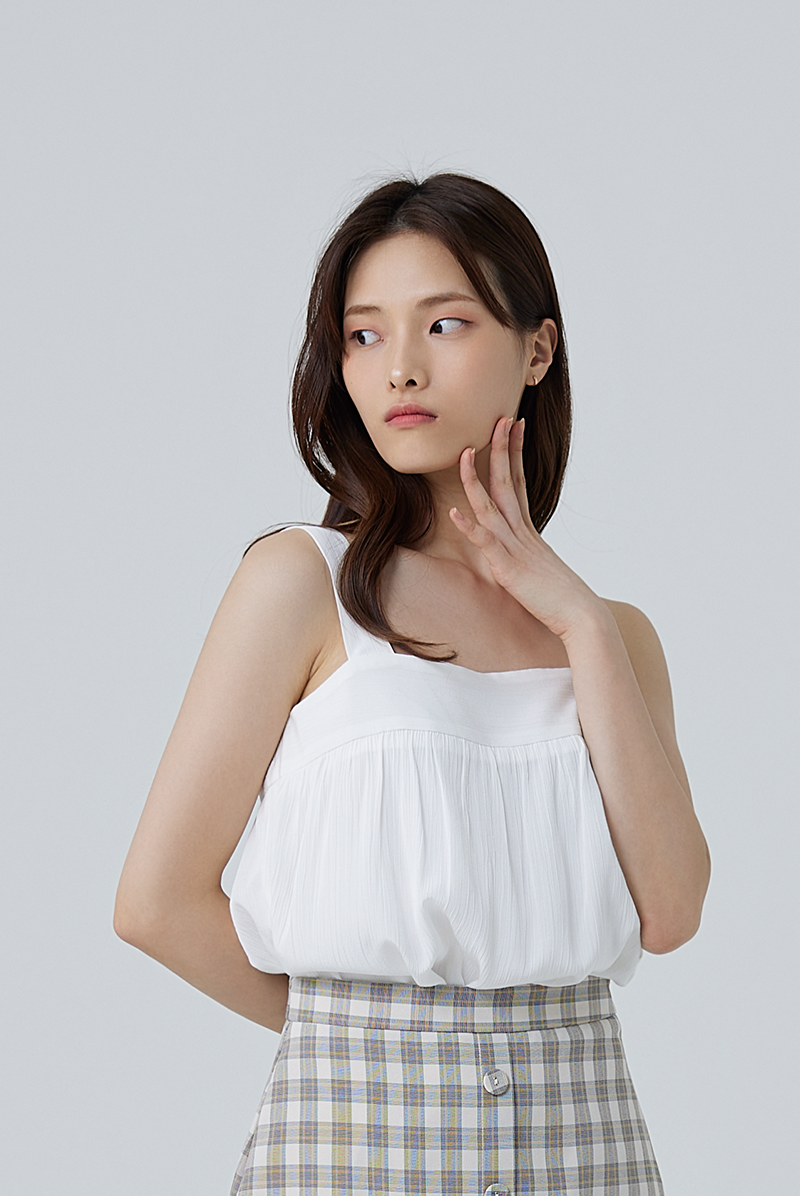 Everly Sleeveless Flowy Blouse in White