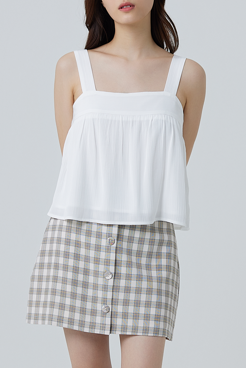 Everly Sleeveless Flowy Blouse in White