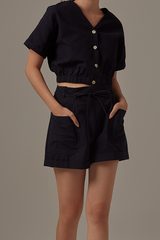 Nadra Pleated Shorts in Navy Blue